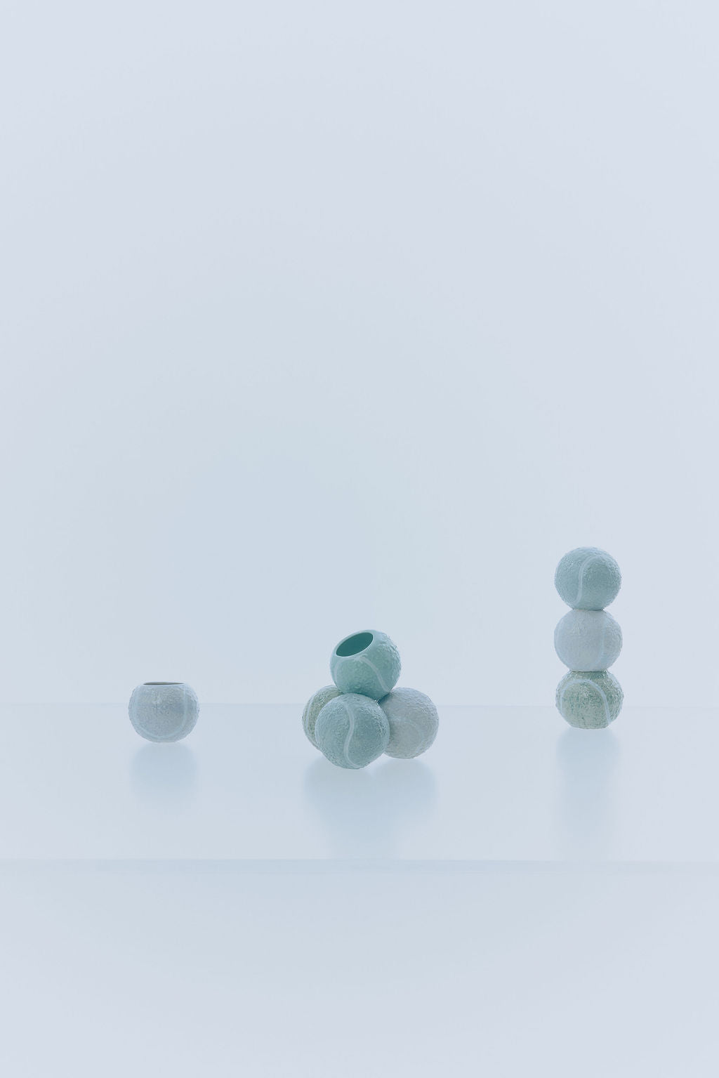 'solem' tennis ball trio sculpture