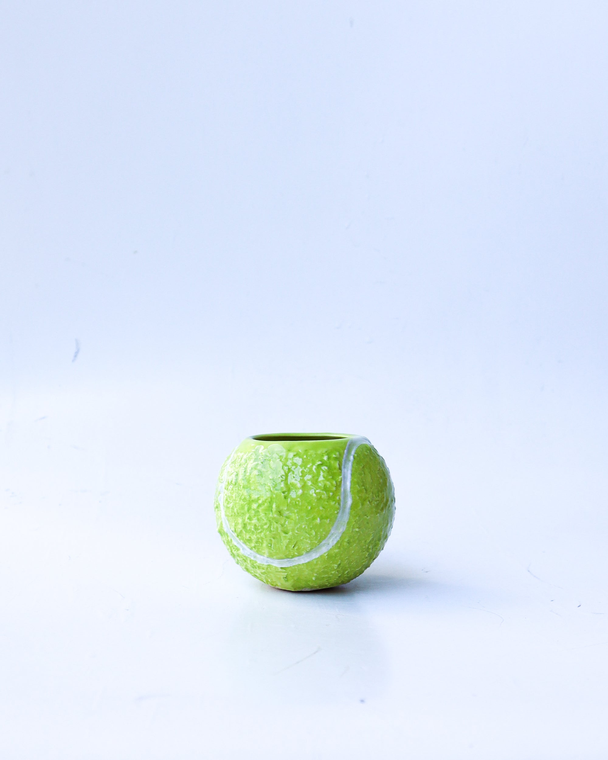 'ace' ceramic tennis ball cup