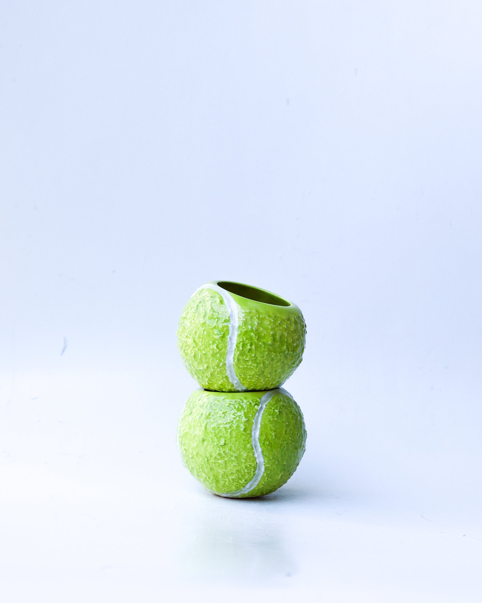 'ace' ceramic tennis ball cup