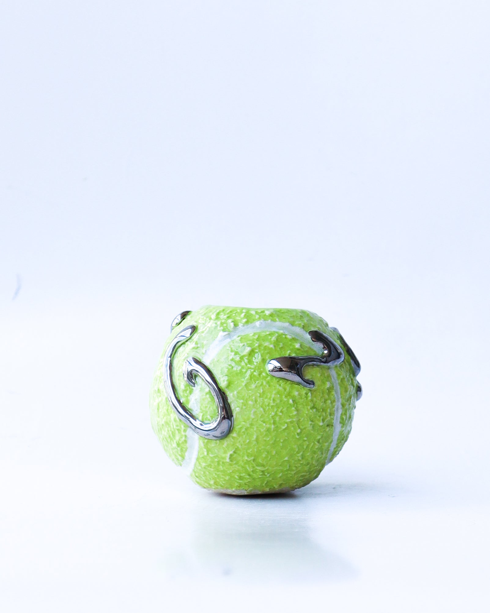 'eala' chrome ceramic tennis ball cup