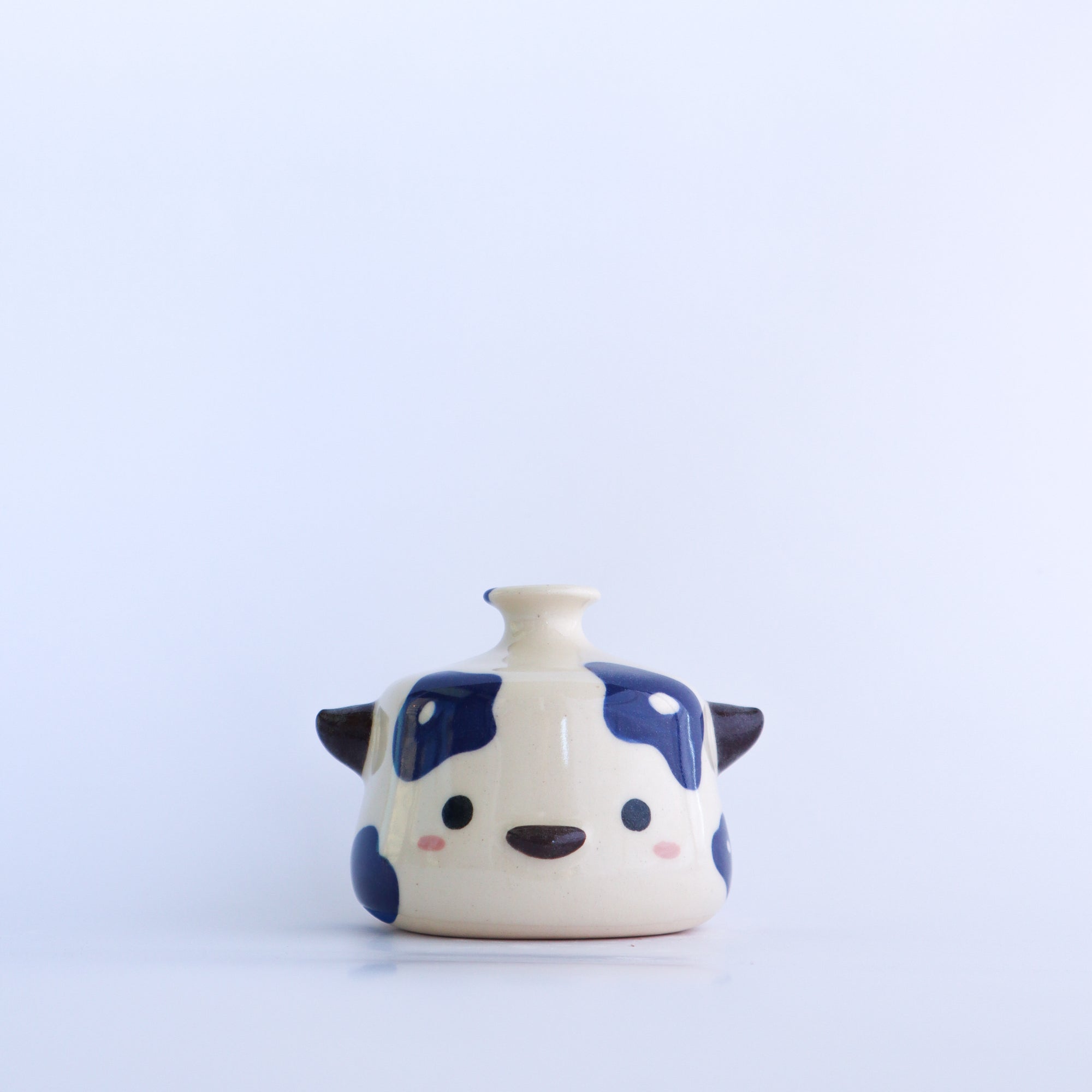flora the cow [watering bell]