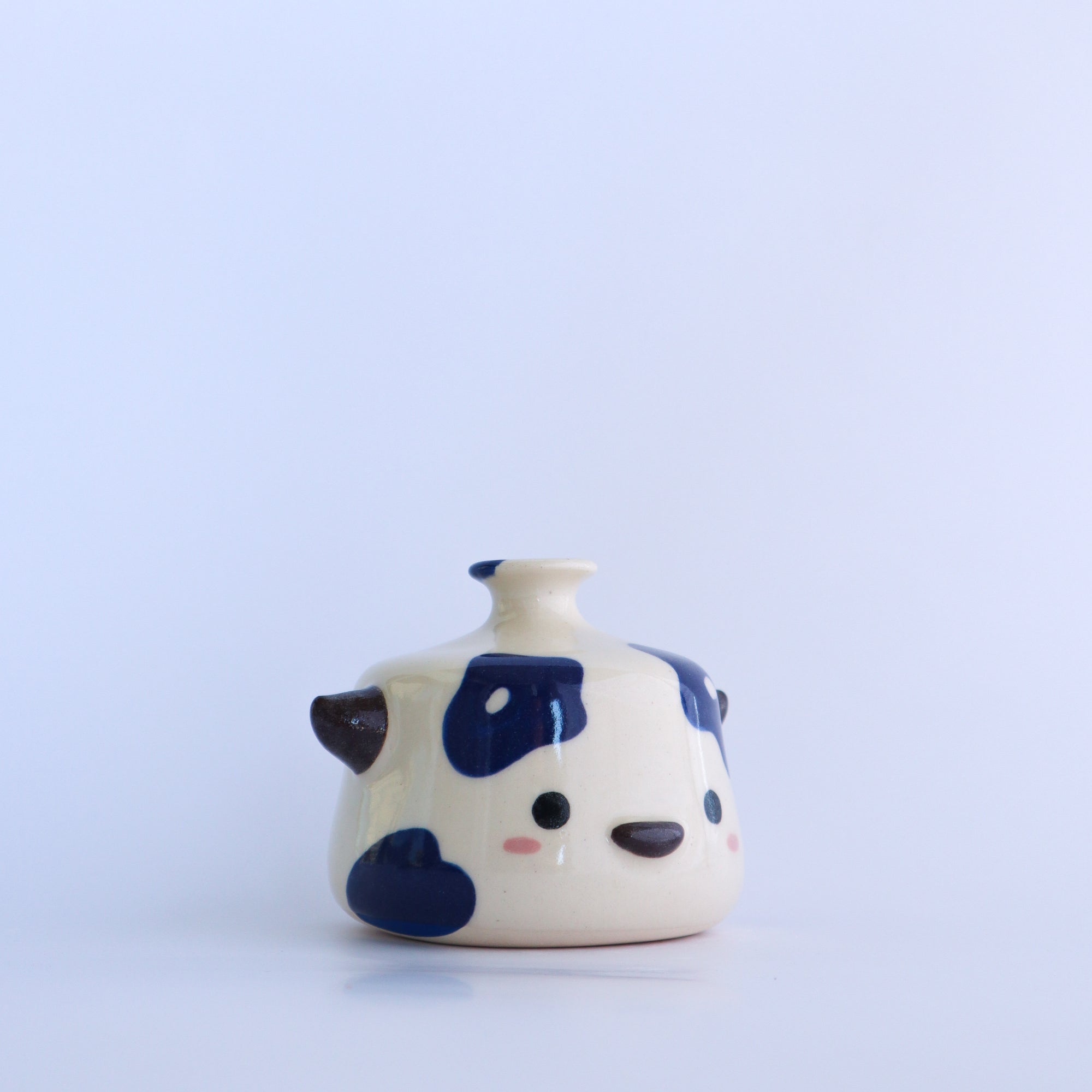 flora the cow [watering bell]