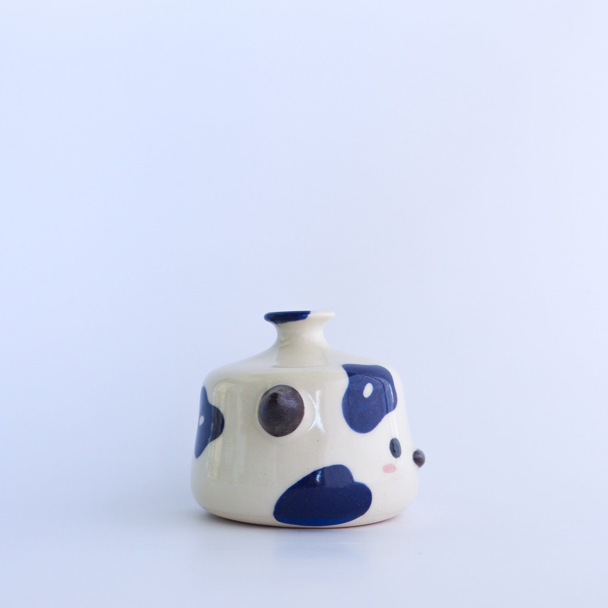 flora the cow [watering bell]