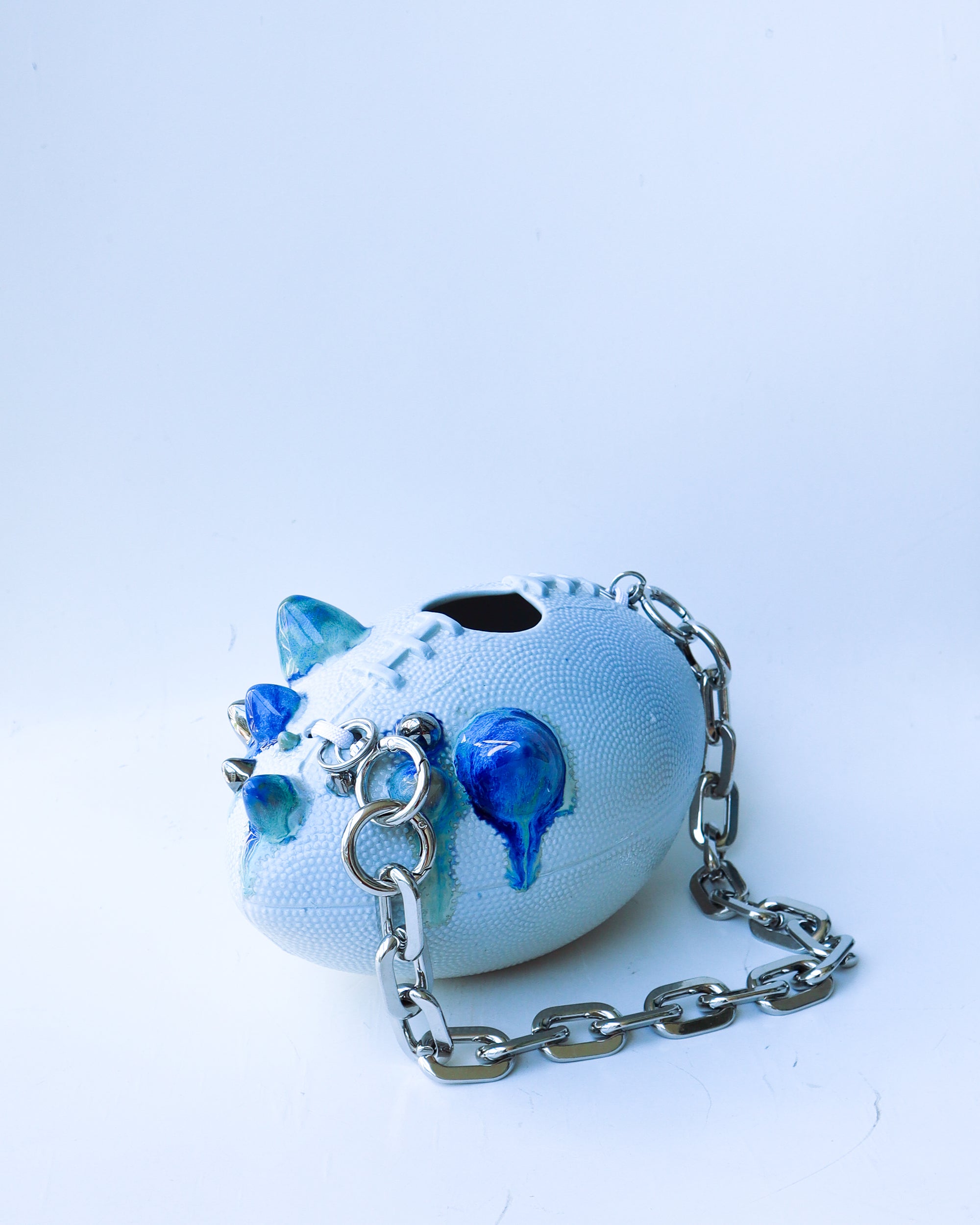 'spike' ceramic football bag