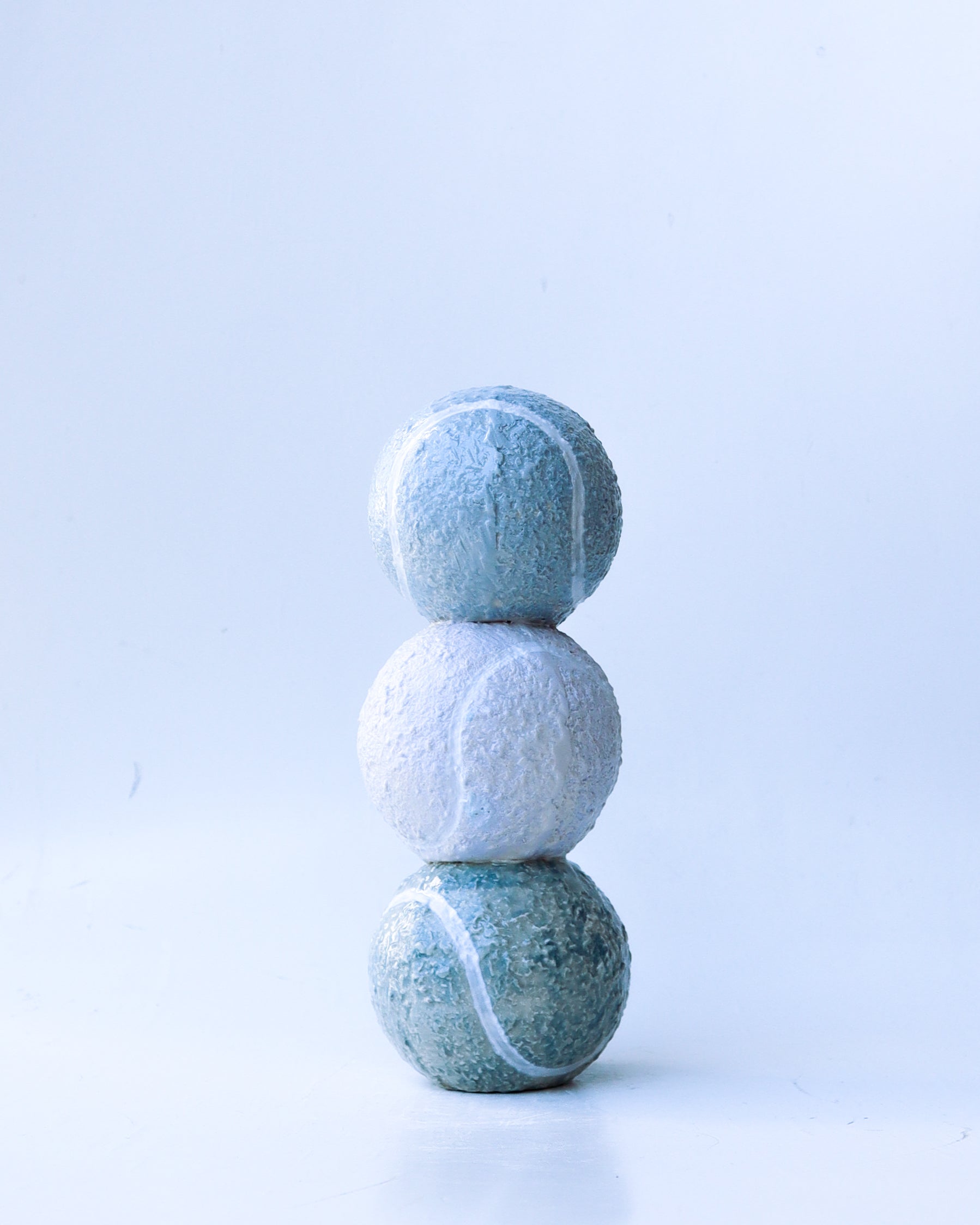 'solem' tennis ball trio sculpture