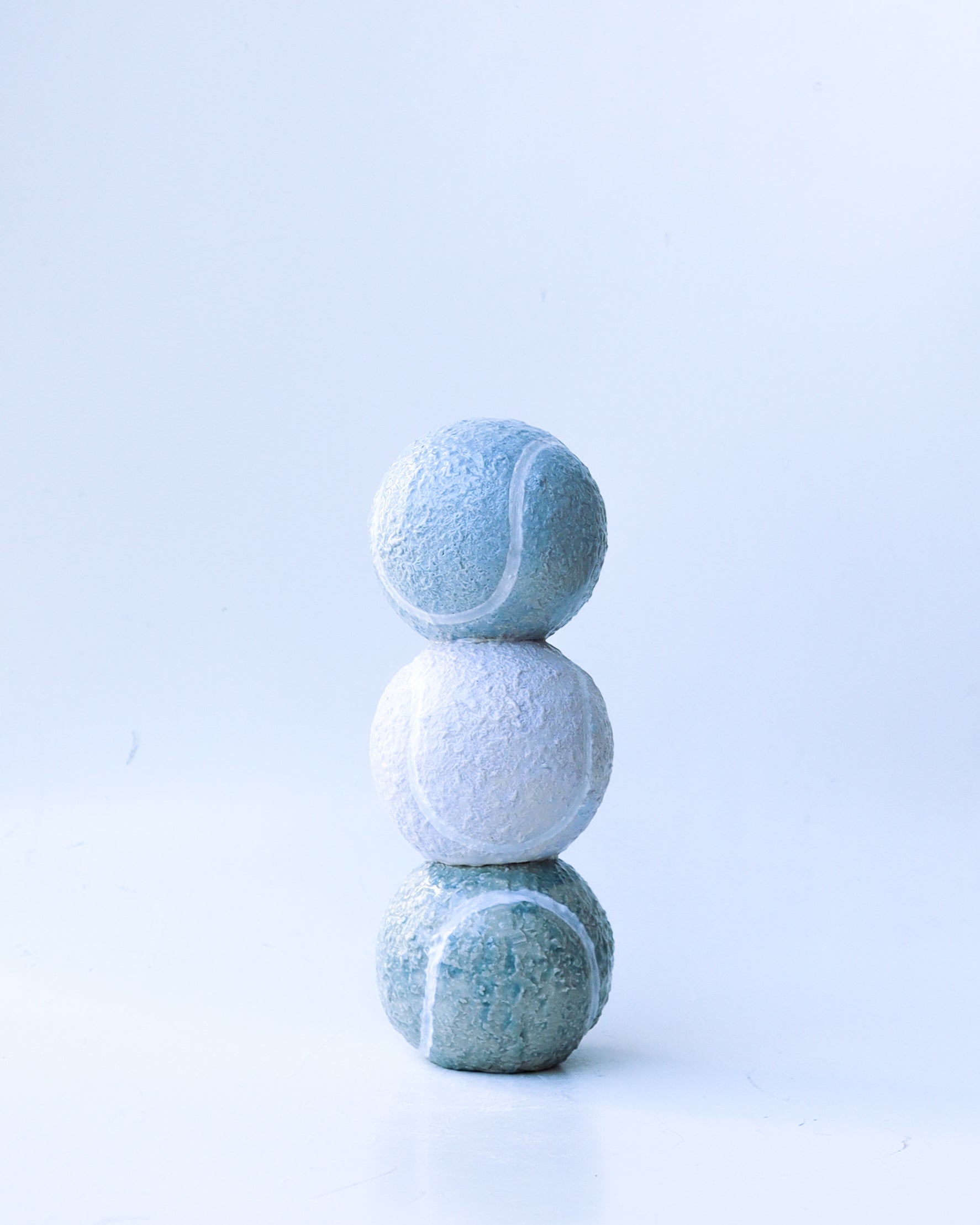 'solem' tennis ball trio sculpture